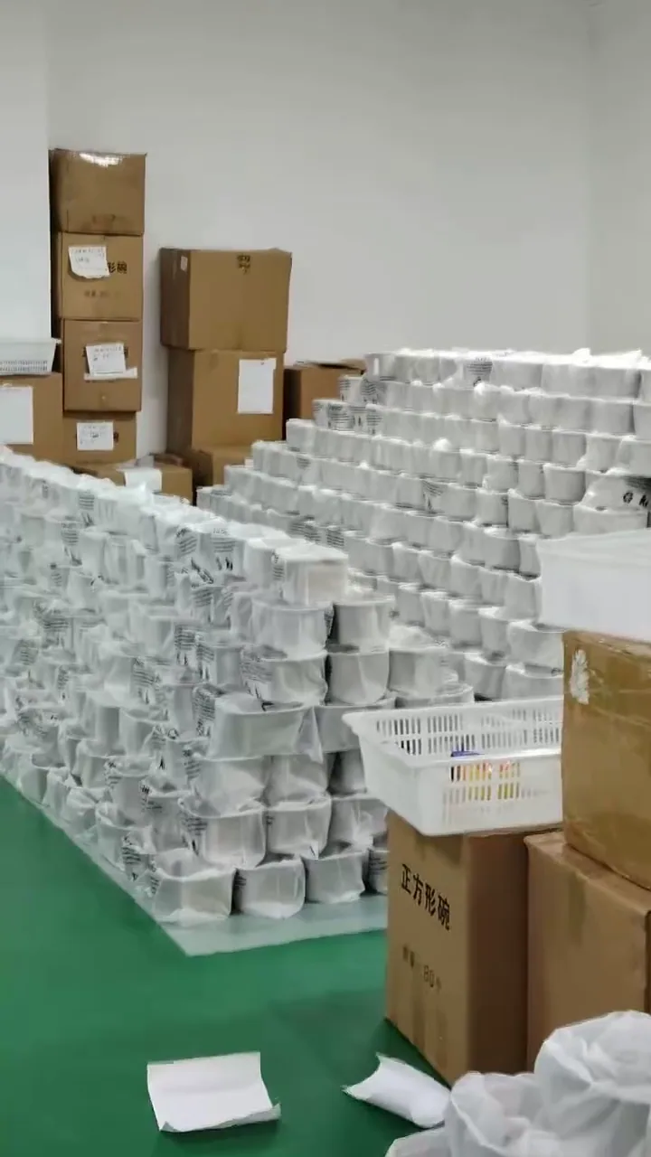 Protected fountain bodies and cartons staged inside the factory