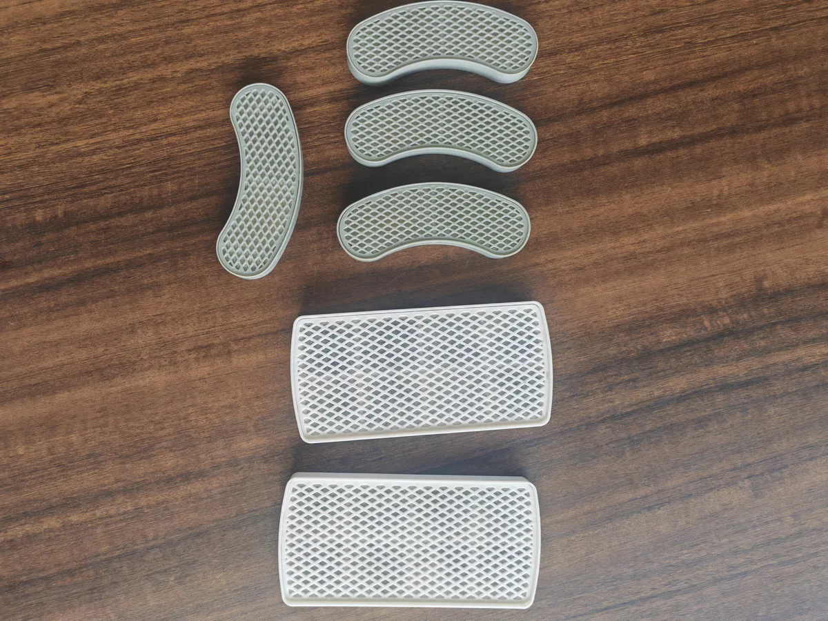 Real crescent and rectangular Fountelio fountain filter cartridges arranged for format comparison
