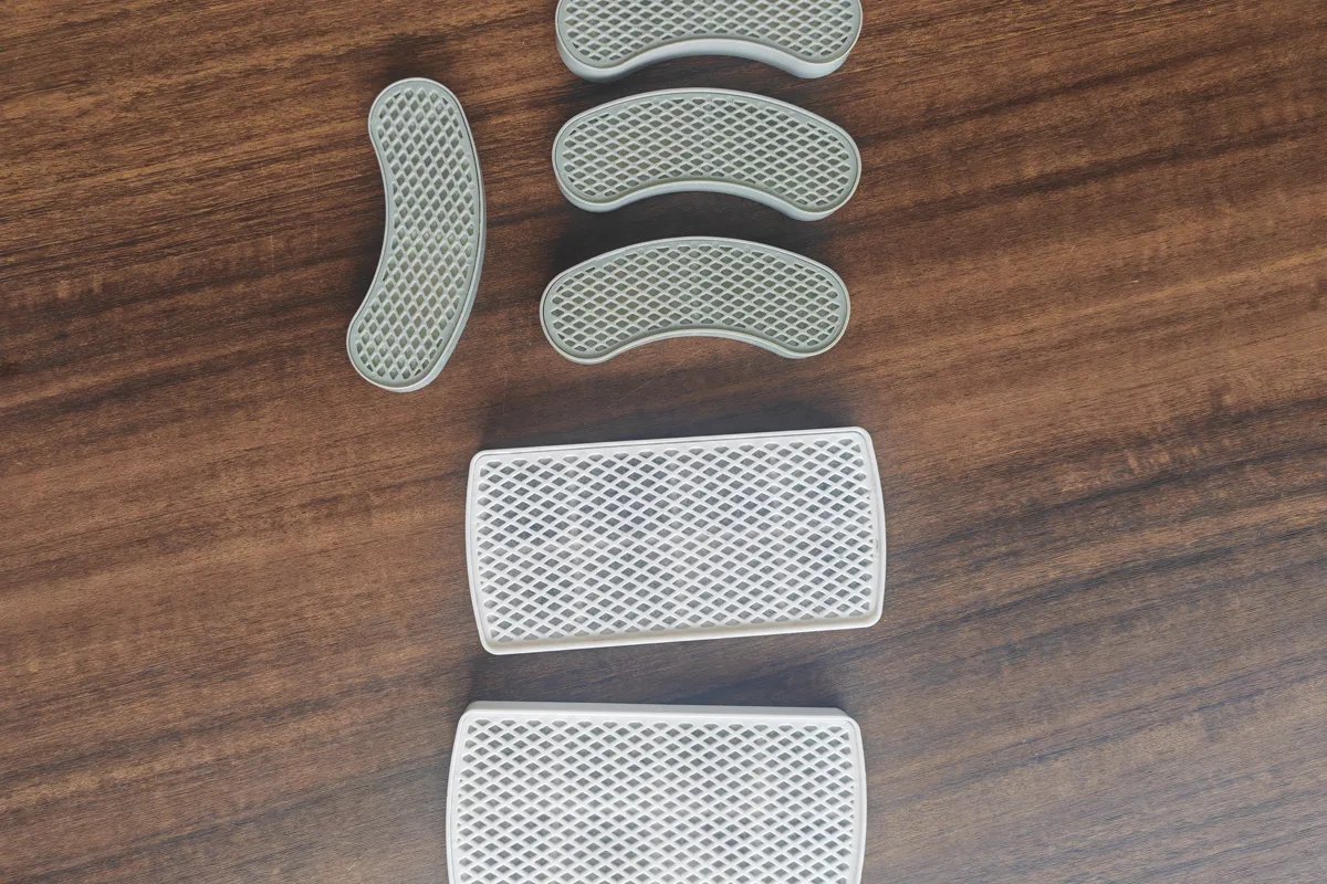Crescent and rectangular Fountelio cat water fountain filter formats shown side by side